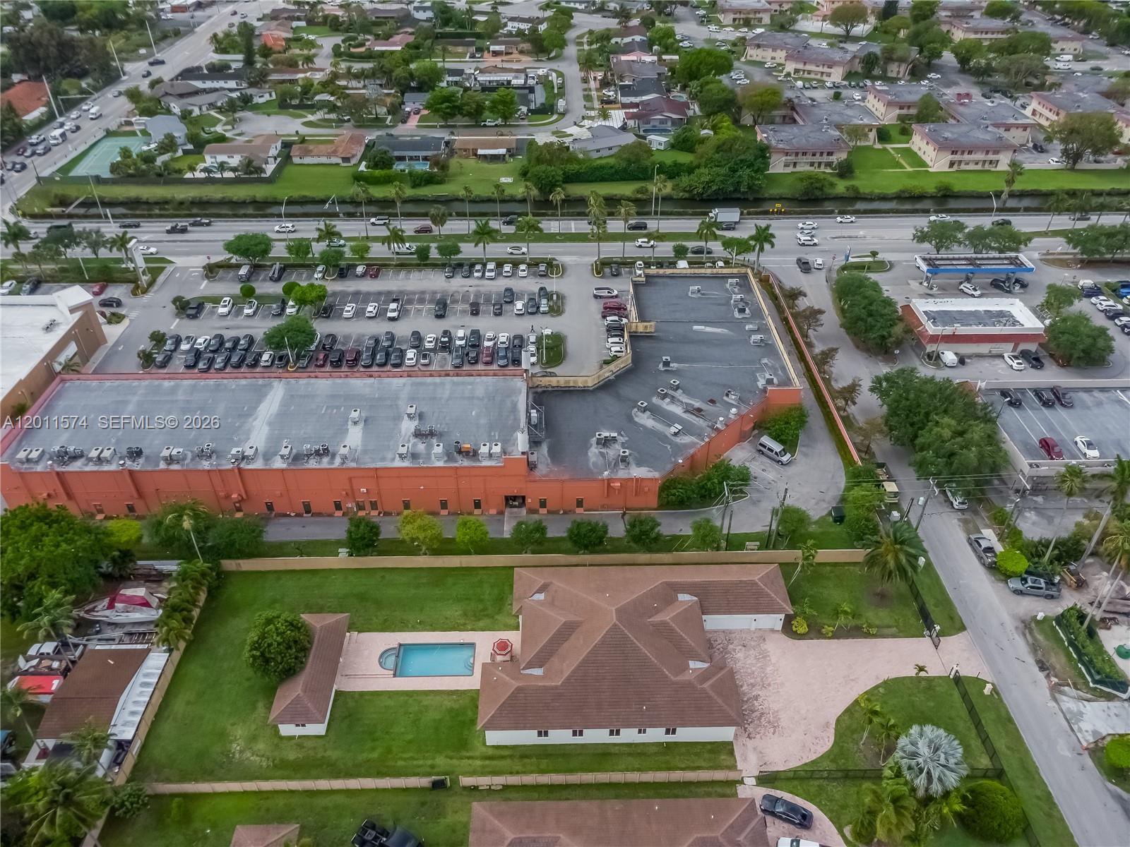 4025 Southwest 128th Avenue Miami, FL 33175 - Photo 76 of 93 an aerial view of house with yard swimming pool and outdoor seating