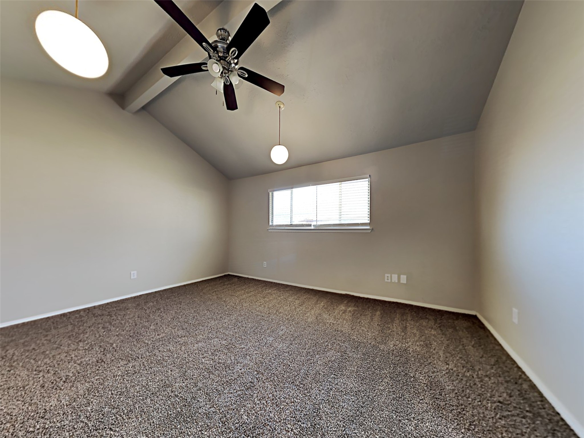 14919 Wainsfield Lane Channelview, TX 77530 - Photo 13 of 17 an empty room with windows and fan