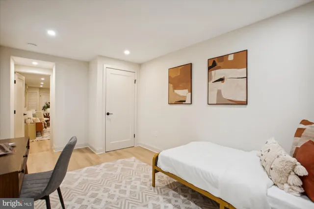 a bedroom with a bed and furniture