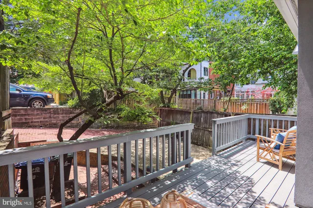 a view of a balcony with chairs