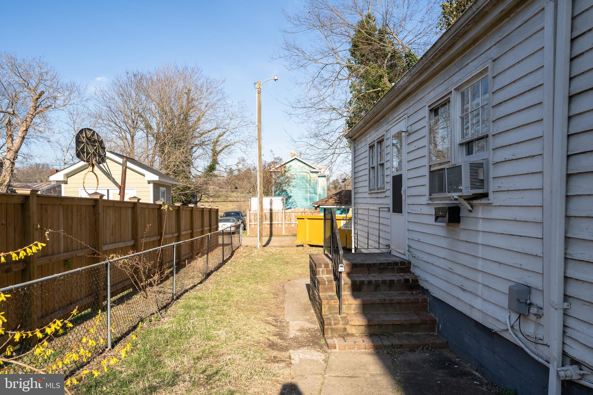 1117 Caroline Street, Unit E Fredericksburg, VA 22401 - Photo 15 of 17 a view of a pathway with a terrace