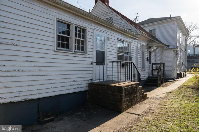 a view of a roof deck with a barbeque