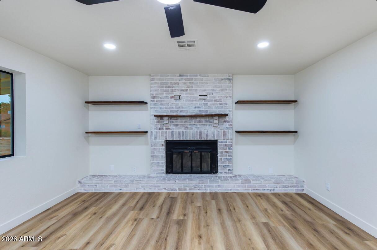 7101 North Perryville Road Waddell, AZ 85355 - Photo 20 of 66 7101 N Perryville fireplace 2