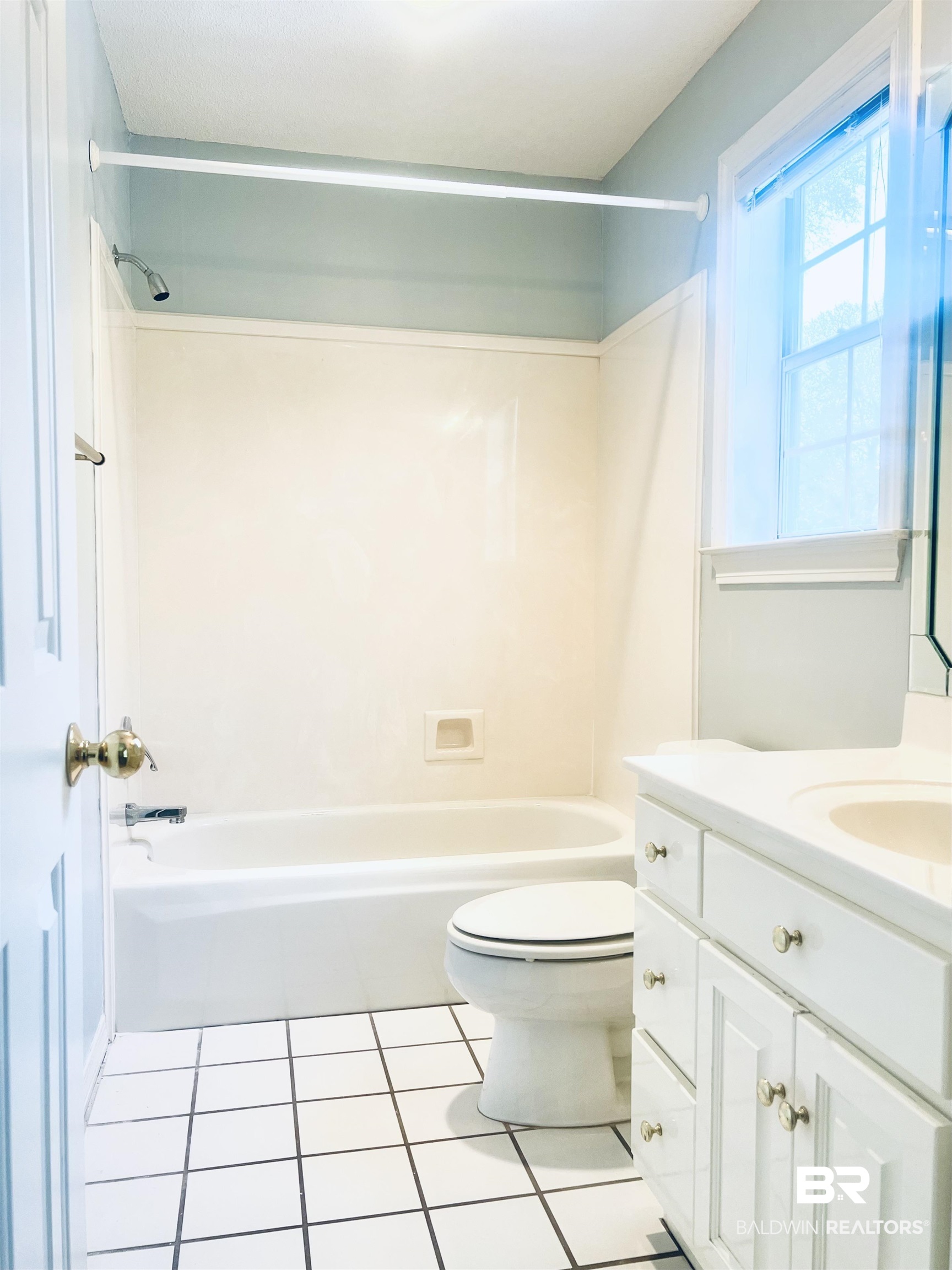 2100 Stonebrook Drive West Mobile, AL 36695 - Photo 41 of 60 Full bathroom featuring shower / tub combination, toilet, tile patterned flooring, and vanity