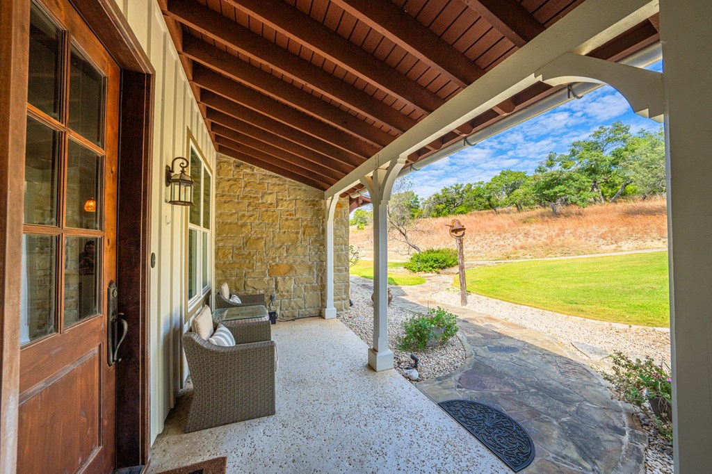 151 Kerr Canyon Pass South Kerrville, TX 78028 - Photo 2 of 45 a view of balcony with furniture