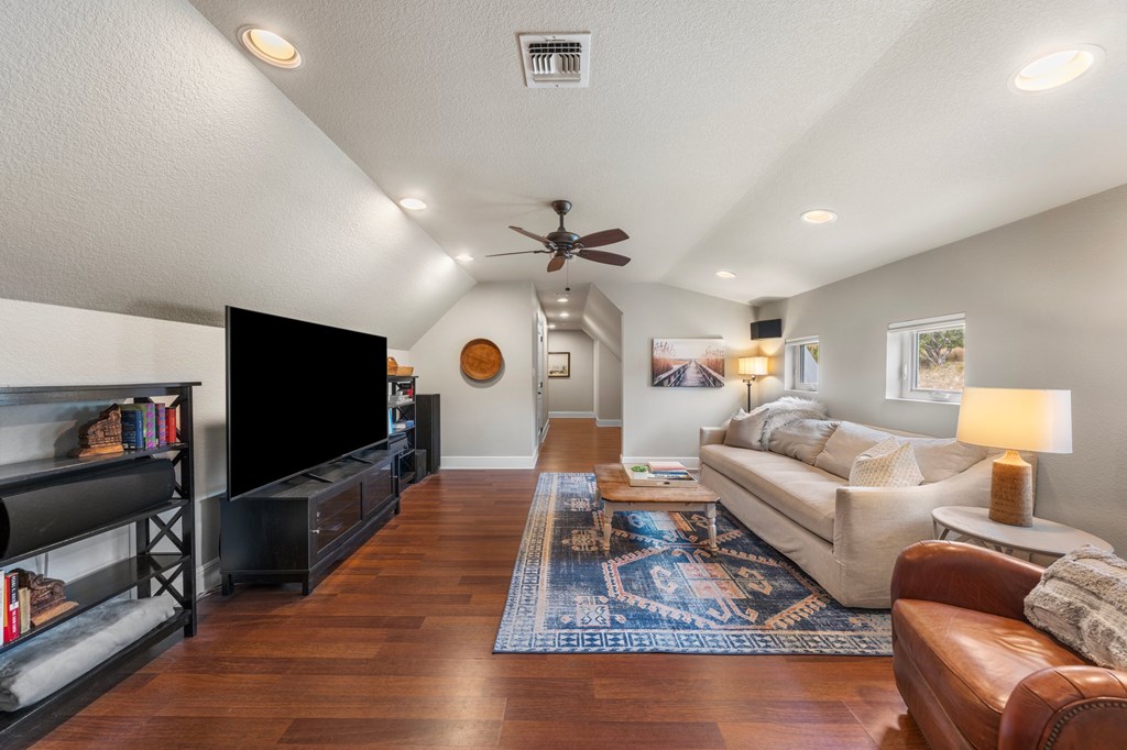151 Kerr Canyon Pass South Kerrville, TX 78028 - Photo 21 of 45 a living room with furniture and a flat screen tv