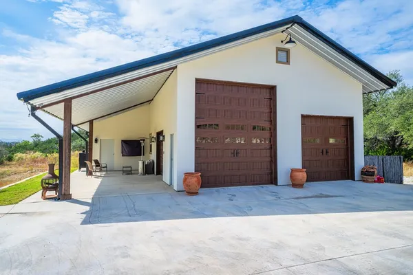 a view of a house with a patio