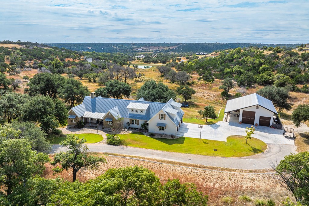 151 Kerr Canyon Pass South Kerrville, TX 78028 - Photo 45 of 45 a view of a swimming pool with a yard