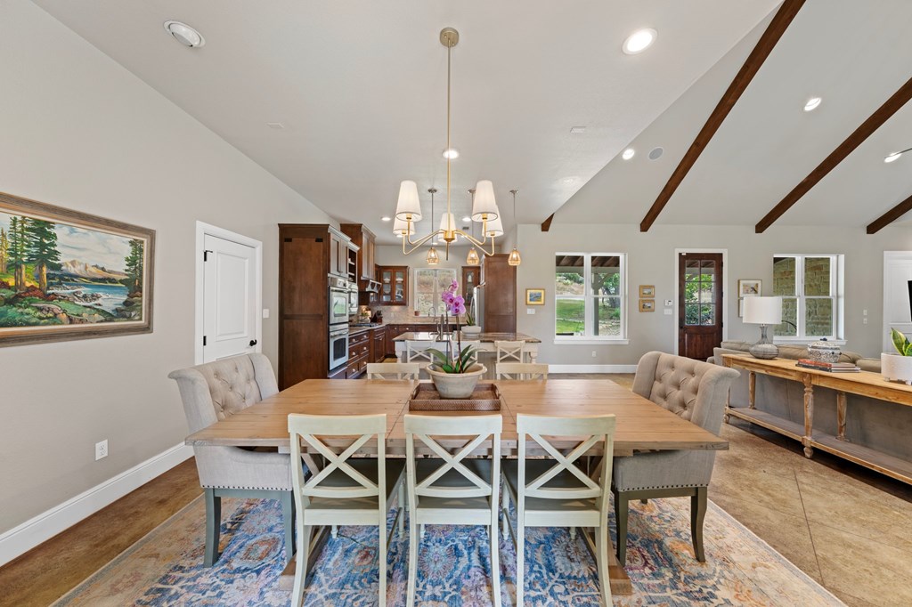 151 Kerr Canyon Pass South Kerrville, TX 78028 - Photo 5 of 45 a view of a dining room with furniture window and wooden floor