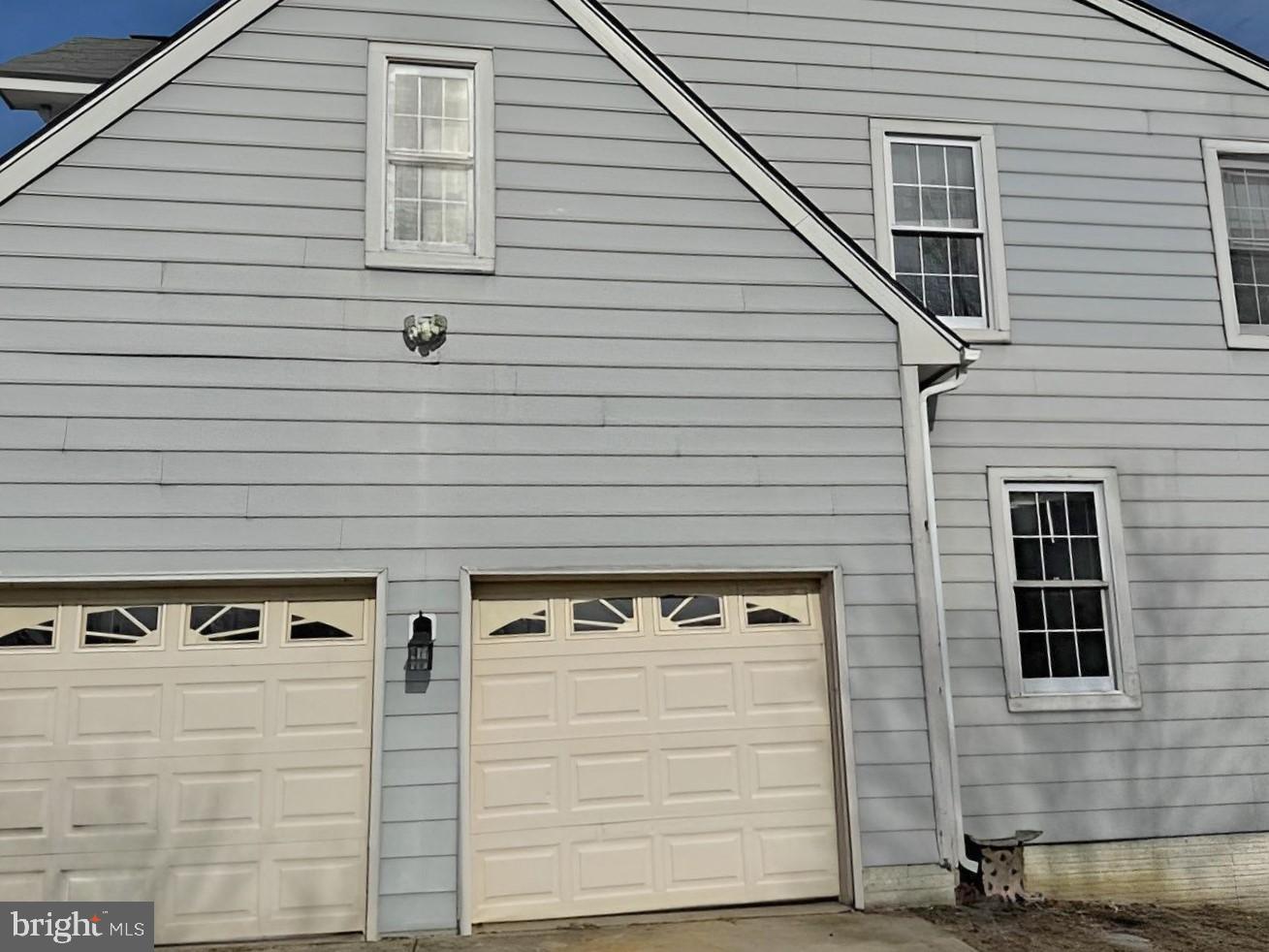 2103 Parkside Drive Bowie, MD 20721 - Photo 3 of 32 a side view of a white building