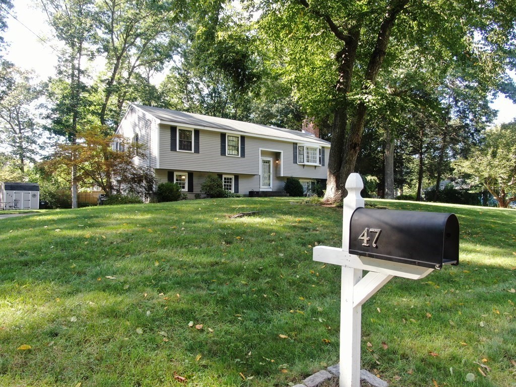 47 Intervale Road Sudbury, MA 01776 - Photo 1 of 1 a house view with a sitting space and garden