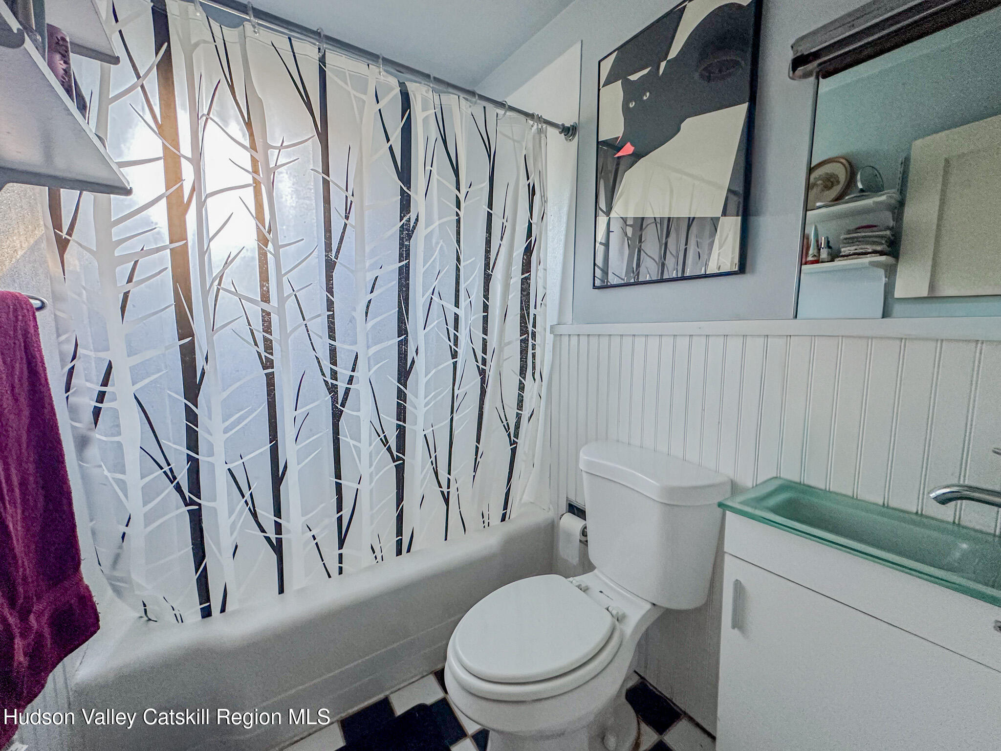 91 Drake Hill Road Greenville, NY 12431 - Photo 12 of 28 a white toilet sitting next to a bathroom sink