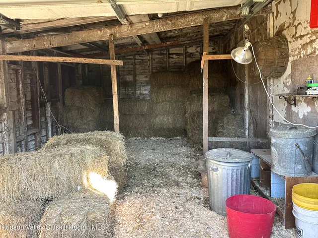 a bathroom with a granite countertop toilet sink and shower