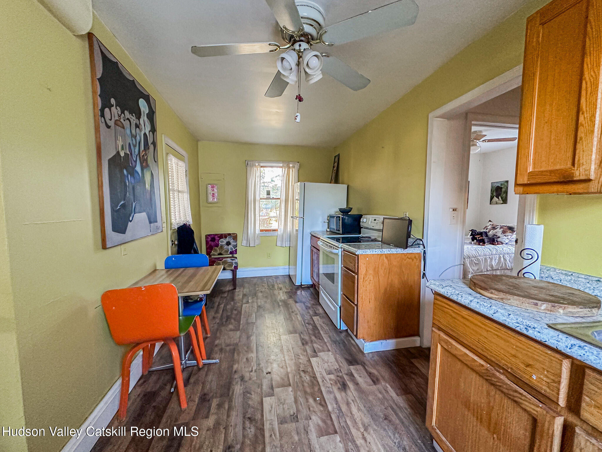 91 Drake Hill Road Greenville, NY 12431 - Photo 9 of 28 a kitchen with stainless steel appliances granite countertop sink stove top oven and cabinets