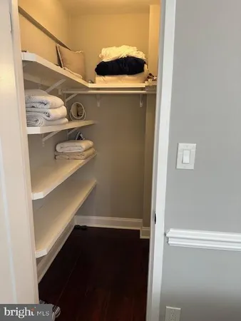 a close up of a storage and utility room with washer and dryer