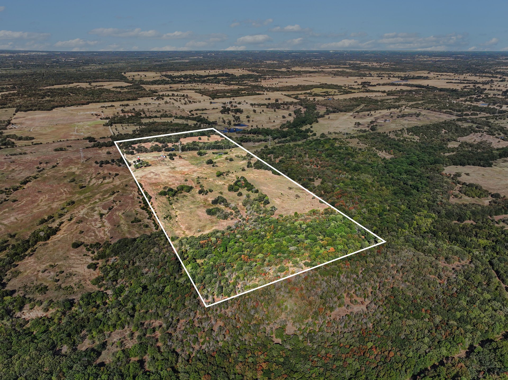 12526 3520th Road Seminole, OK 74868 - Photo 5 of 42 Expansive land parcel featuring open fields and mature tree coverage