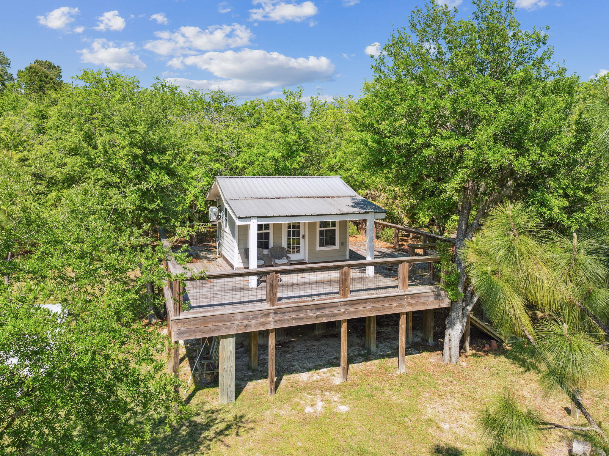 233 Shady Lane Freeport, FL 32439 - Photo 3 of 10 an aerial view of a house with a balcony