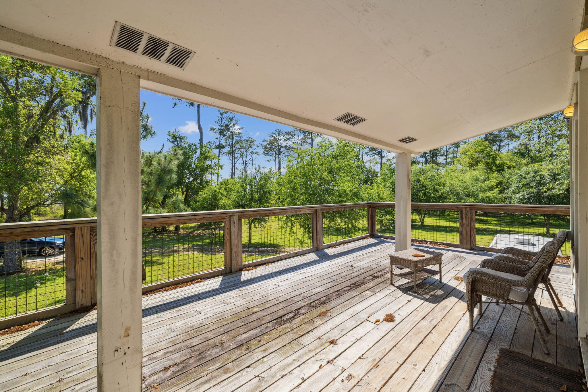 233 Shady Lane Freeport, FL 32439 - Photo 5 of 10 a view of two chairs in a balcony