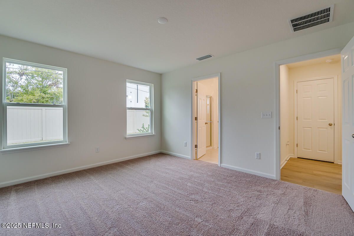 66 Stonecrest Drive St. Johns, FL 32259 - Photo 13 of 22 a view of an empty room with a window