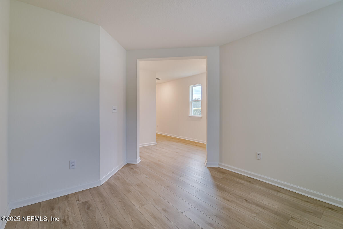 66 Stonecrest Drive St. Johns, FL 32259 - Photo 4 of 22 a view of a room with wooden floor