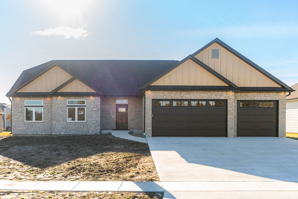 a view of a house with a garage