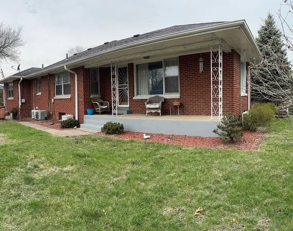 a front view of a house with patio