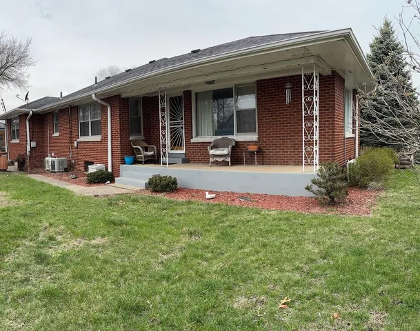 a front view of a house with patio