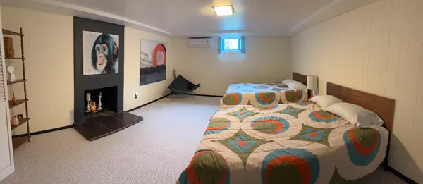 a room with furniture and a flat screen tv