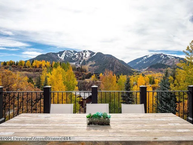 a view of a house with a ocean view