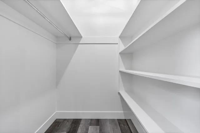 a view of an empty walk in closet