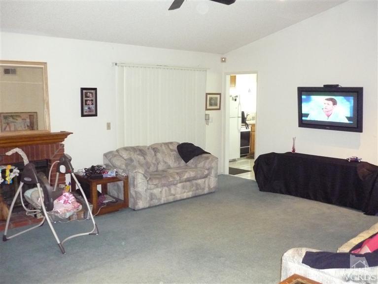 3143 Cherokee Street Riverside, CA 92503 - Photo 4 of 7 a living room with furniture and a couch