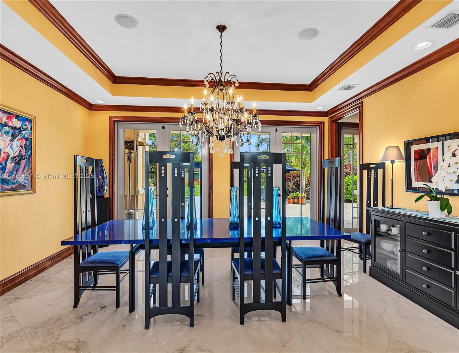 13425 Southwest 37th Place Davie, FL 33330 - Photo 20 of 100 a view of a dining room with furniture and chandelier