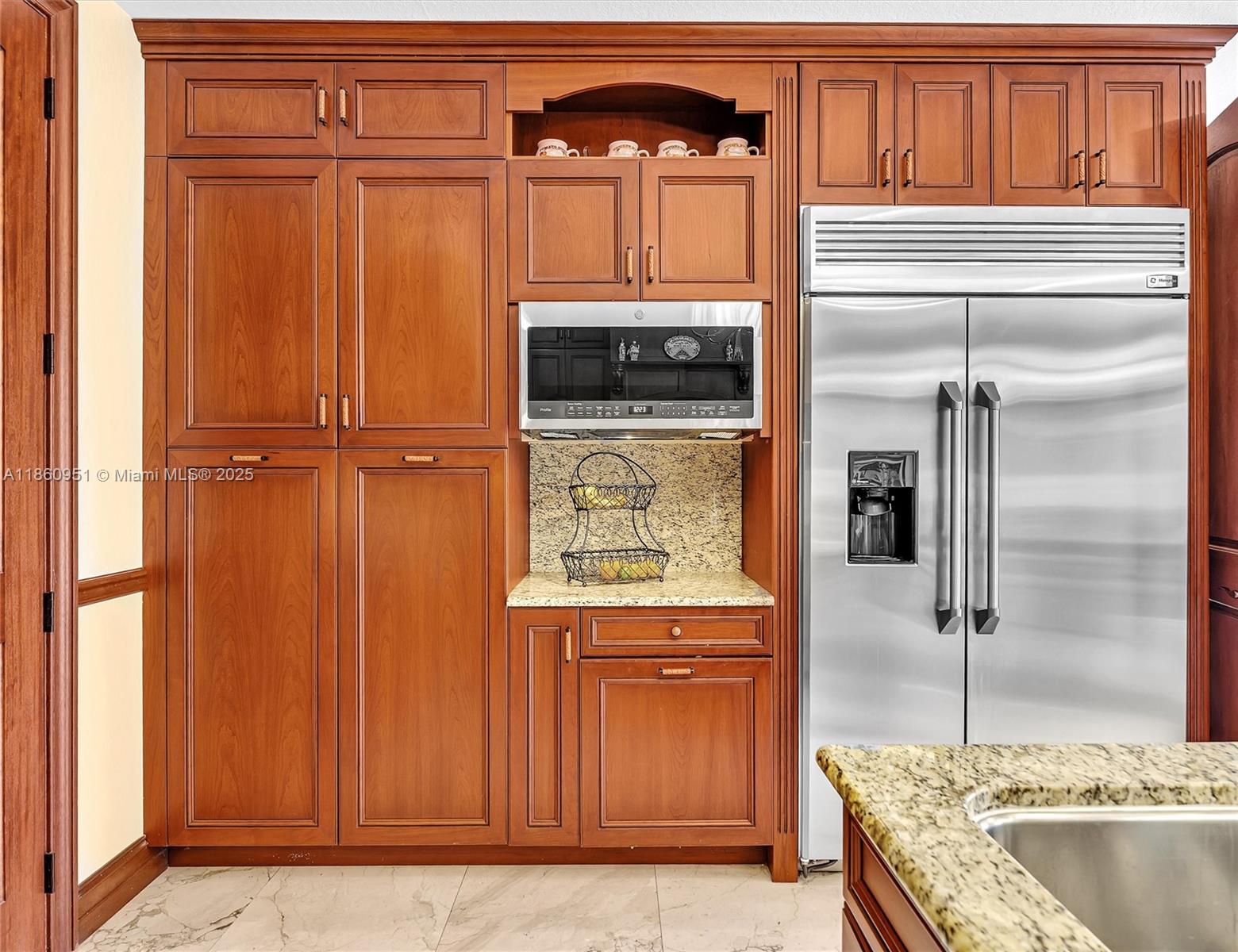 13425 Southwest 37th Place Davie, FL 33330 - Photo 32 of 100 a kitchen with a refrigerator and a stove