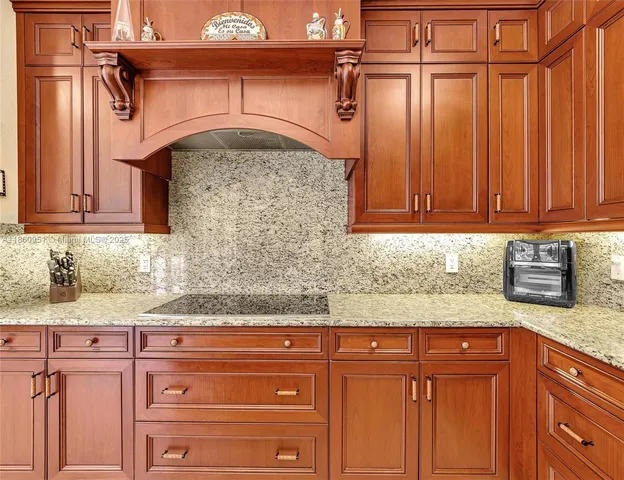 a bed room with a bed and a chandelier