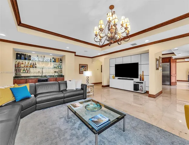 a kitchen with sink stove and refrigerator