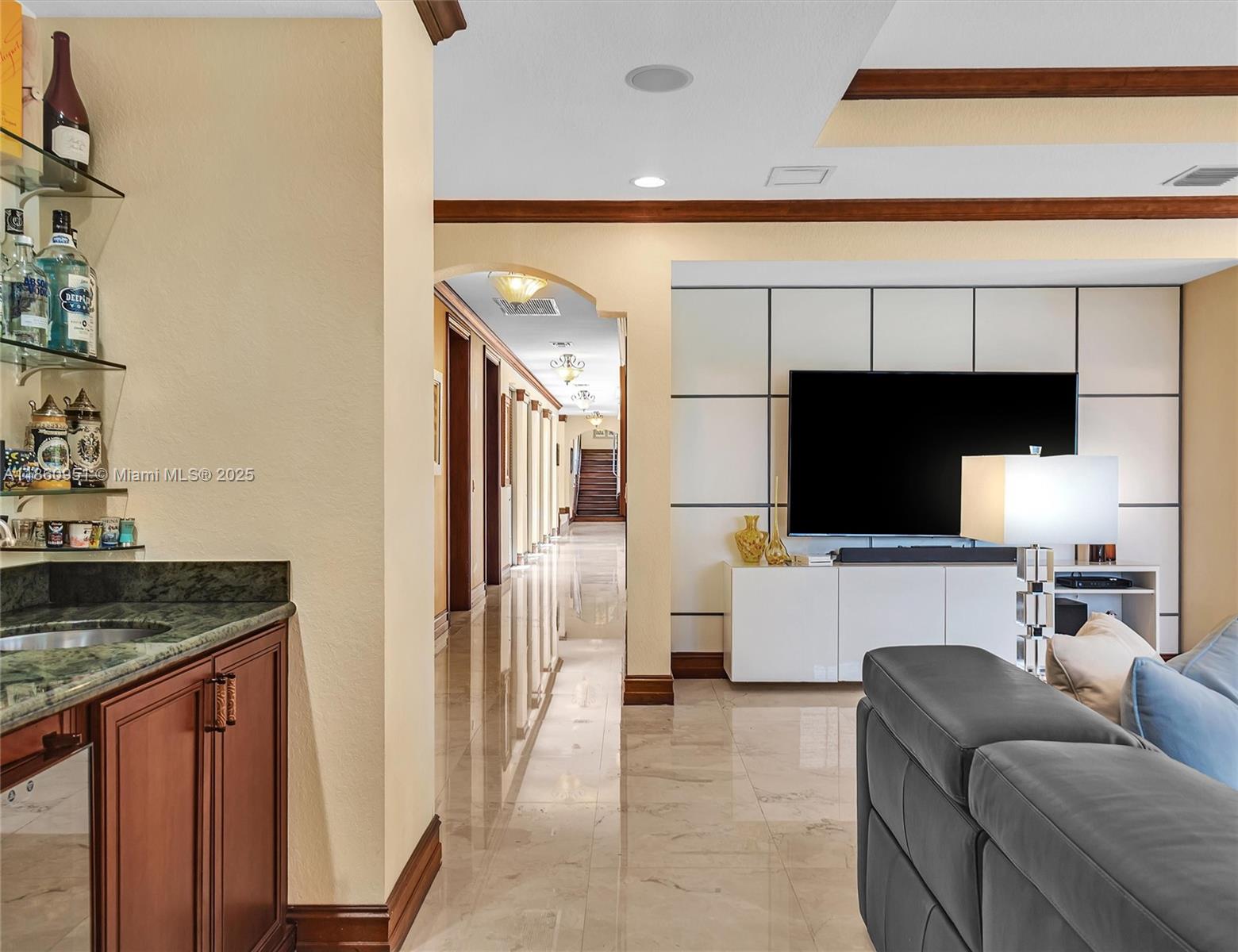 13425 Southwest 37th Place Davie, FL 33330 - Photo 45 of 100 a living room with furniture and a flat screen tv