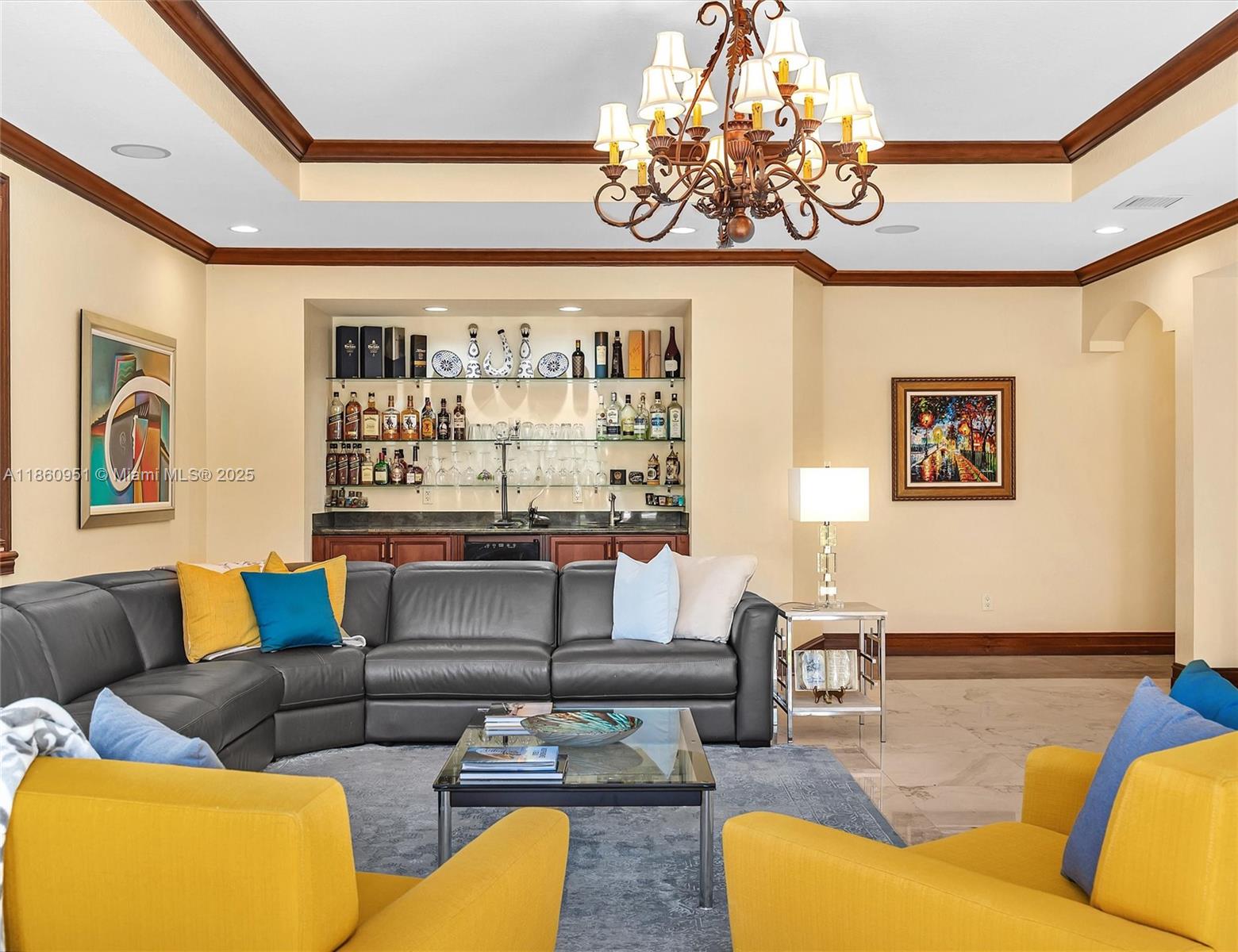 13425 Southwest 37th Place Davie, FL 33330 - Photo 49 of 100 a living room with furniture a chandelier and a flat screen tv