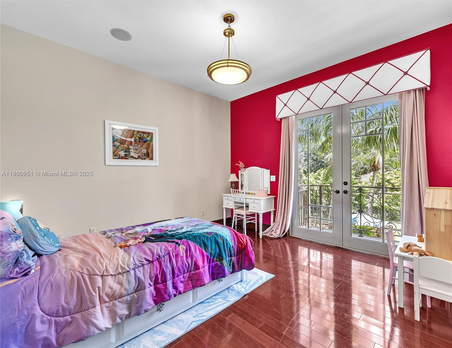 13425 Southwest 37th Place Davie, FL 33330 - Photo 62 of 100 a bedroom with a bed and a chandelier