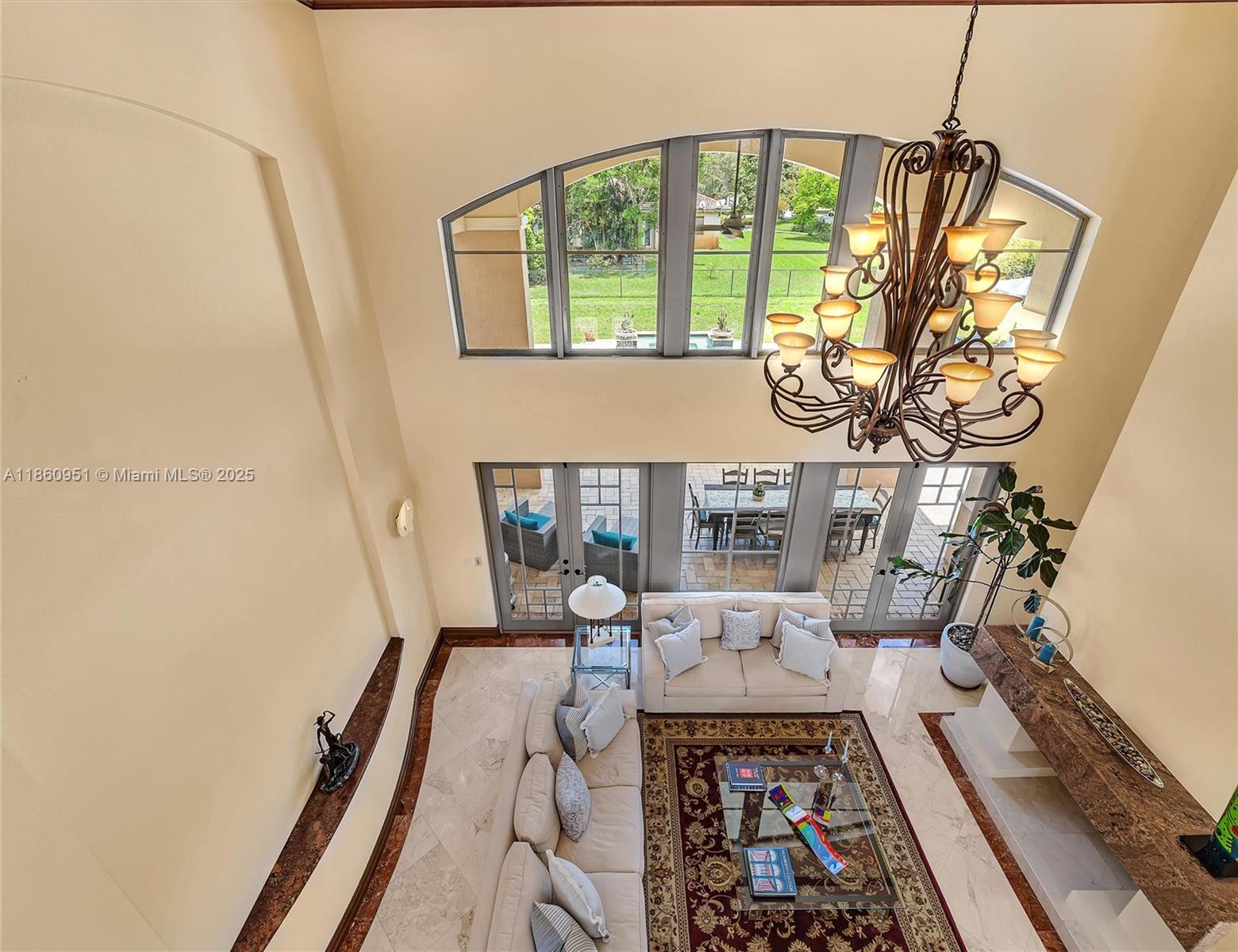 13425 Southwest 37th Place Davie, FL 33330 - Photo 65 of 100 a living room with furniture and a fireplace