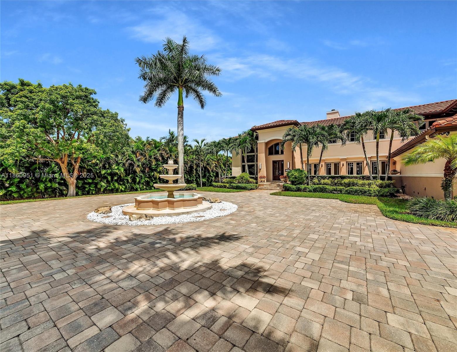 13425 Southwest 37th Place Davie, FL 33330 - Photo 8 of 100 a view of swimming pool with a yard and palm trees