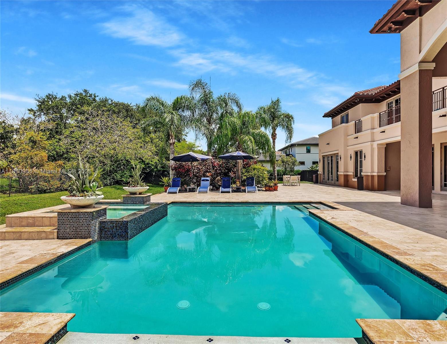 13425 Southwest 37th Place Davie, FL 33330 - Photo 84 of 100 a view of swimming pool with outdoor seating and a garden