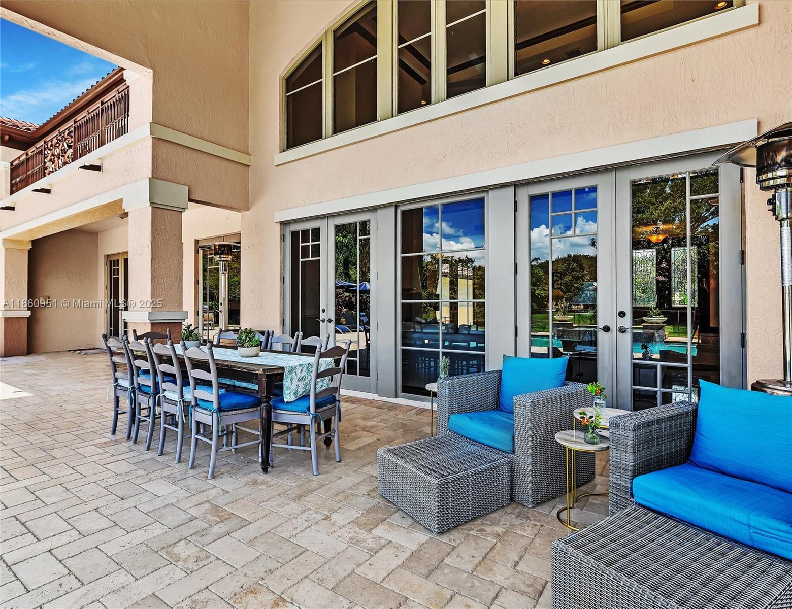 13425 Southwest 37th Place Davie, FL 33330 - Photo 95 of 100 a view of a patio with couches table and chairs and potted plants