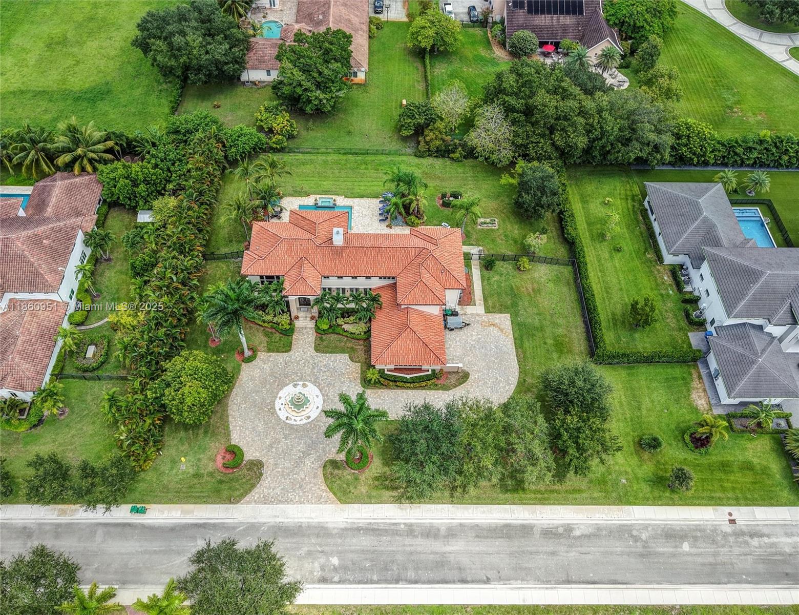 13425 Southwest 37th Place Davie, FL 33330 - Photo 100 of 100 an aerial view of a house with a garden and yard