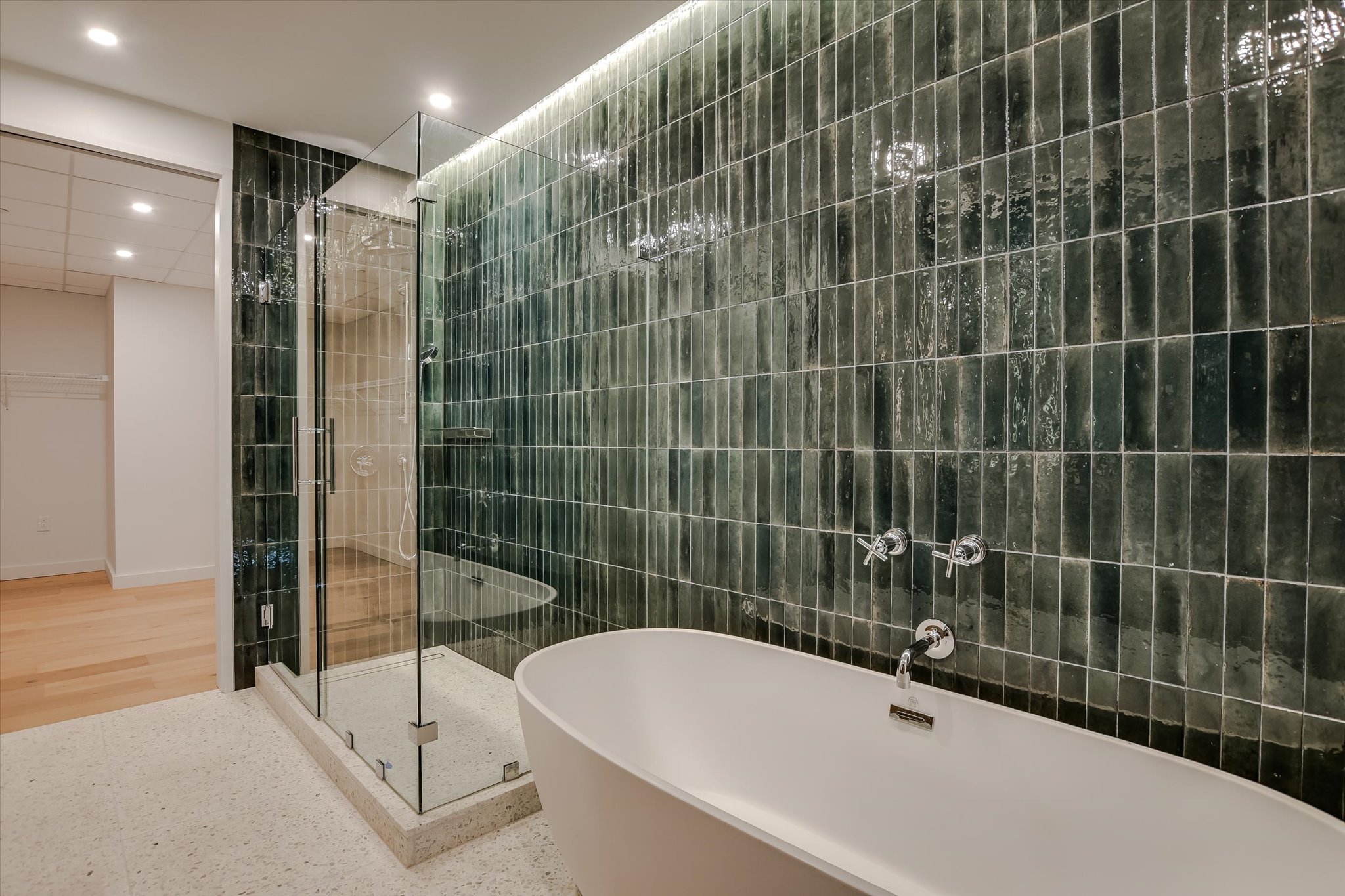 610 Davis Street, Unit 4704 Austin, TX 78701 - Photo 15 of 40 a bathroom with a bathtub and a shower
