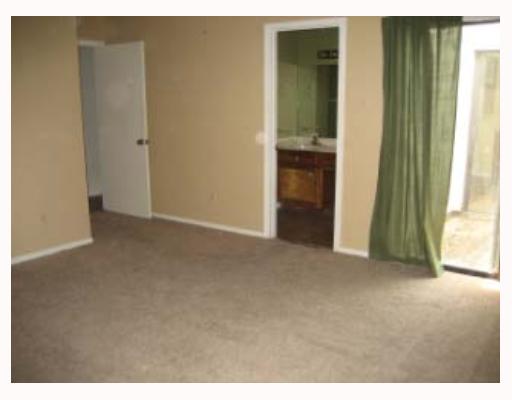 4242 Snowmass Street Corpus Christi, TX 78413 - Photo 6 of 7 a view of an empty room with a window