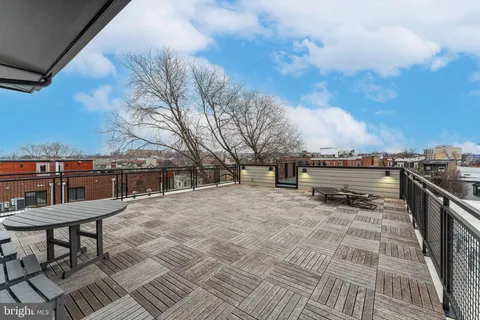 a view of a terrace with chairs