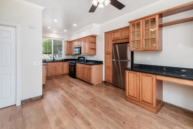 a bathroom with a sink a mirror and a toilet
