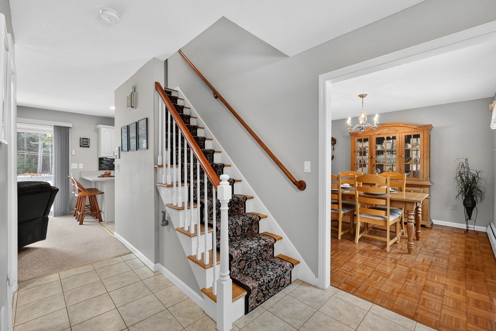 14 Bridle Path Broad Brook, CT 06016 - Photo 16 of 37 a view of a livingroom with furniture and an entryway