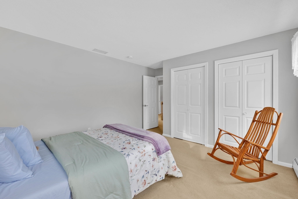 14 Bridle Path Broad Brook, CT 06016 - Photo 23 of 37 a bedroom with a bed chair and the view