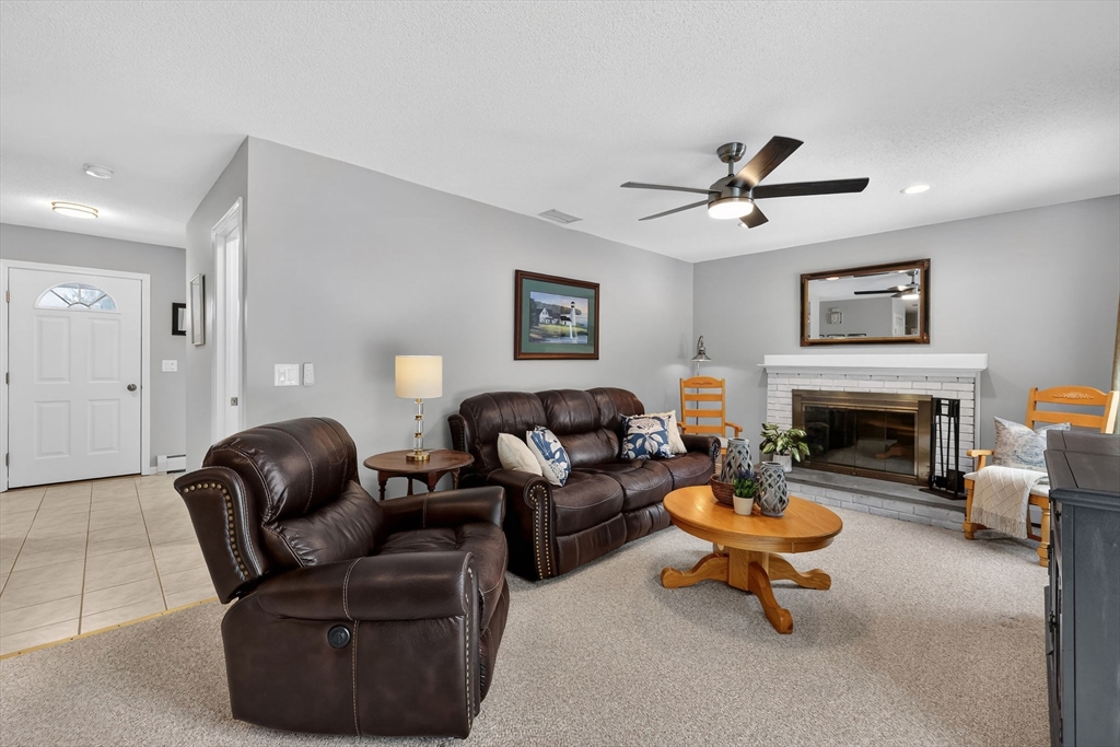 14 Bridle Path Broad Brook, CT 06016 - Photo 3 of 37 a living room with furniture fireplace and window